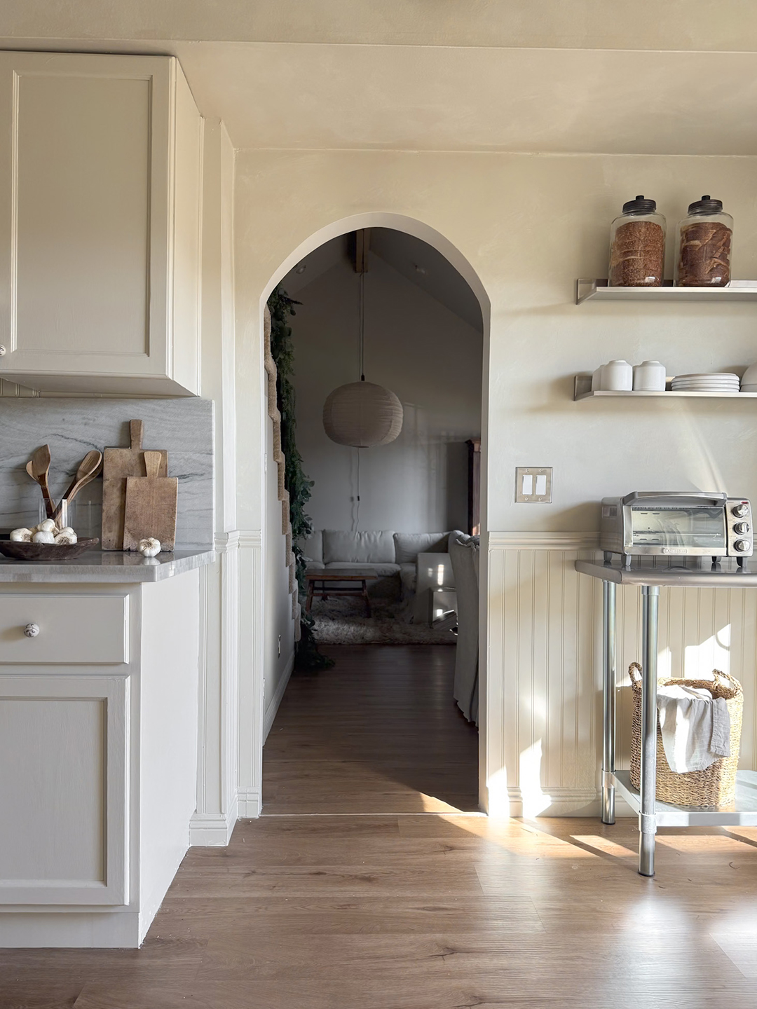 stainless steel shelves next to archway