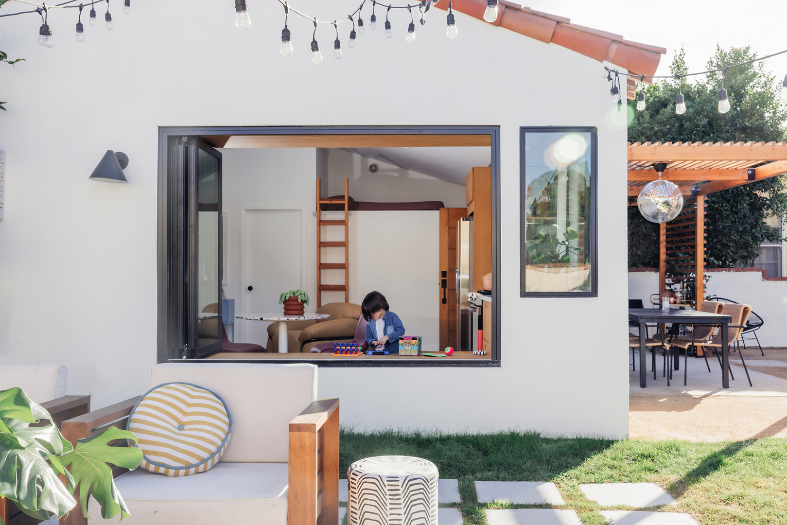 kid playing on window nook