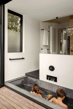 kids in indoor-outdoor tub