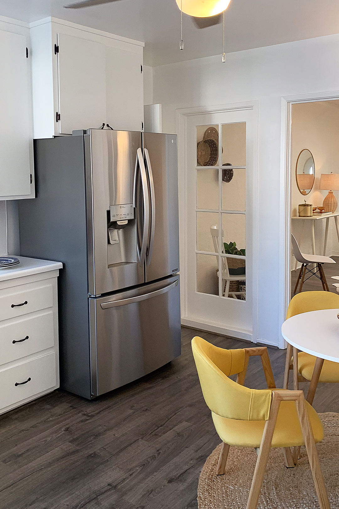 white kitchen with big fridge