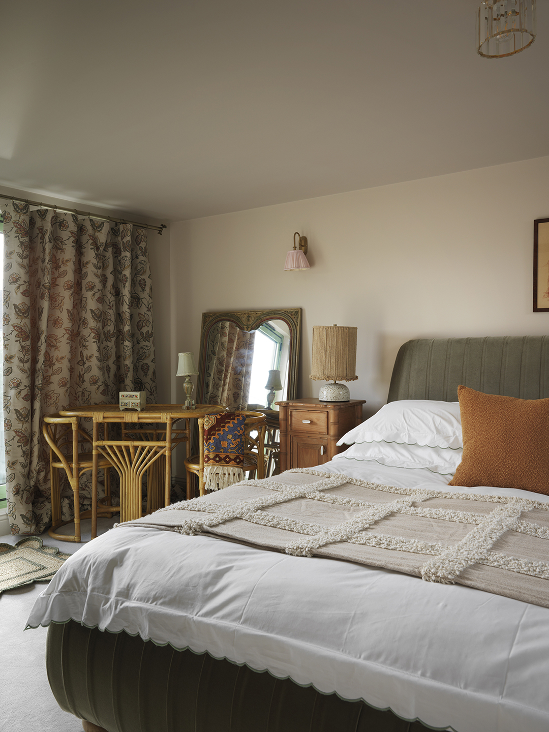 bedroom with bamboo table in corner