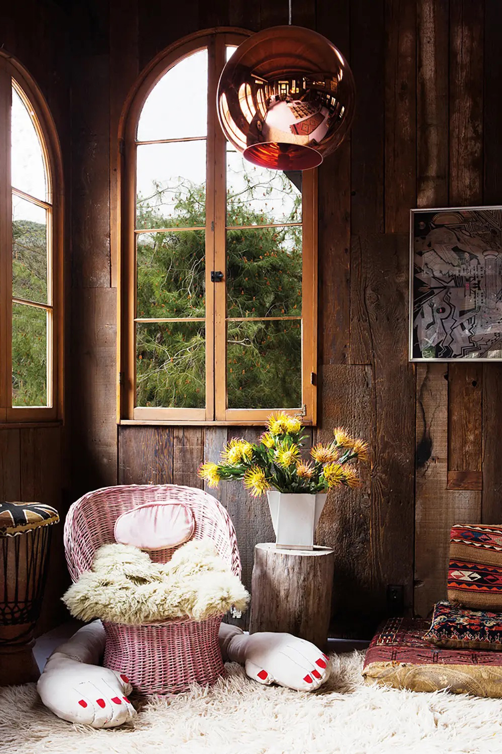 wood paneled corner with large windows