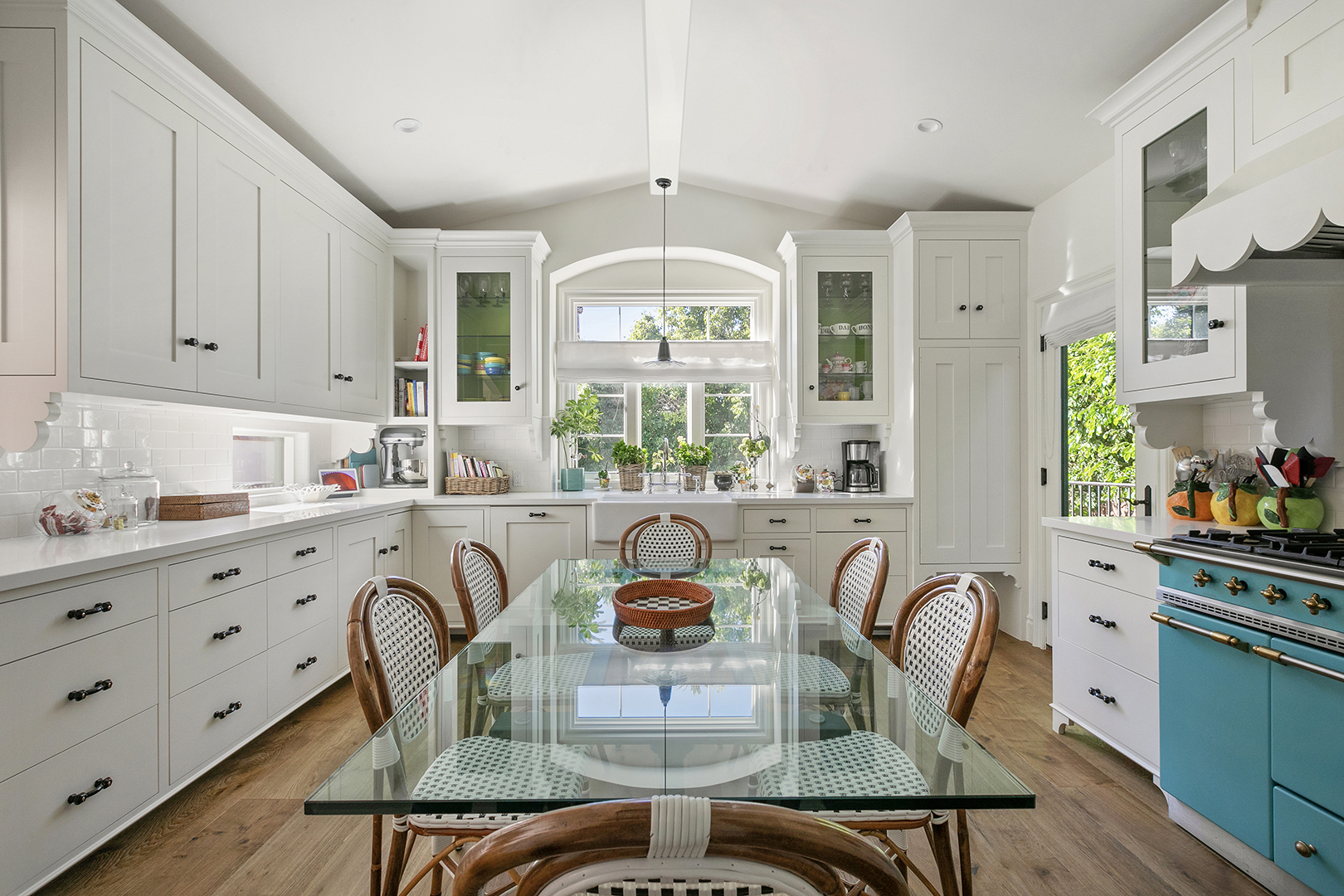 white kitchen with blue range