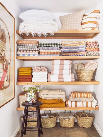 towels stacked in linen closet