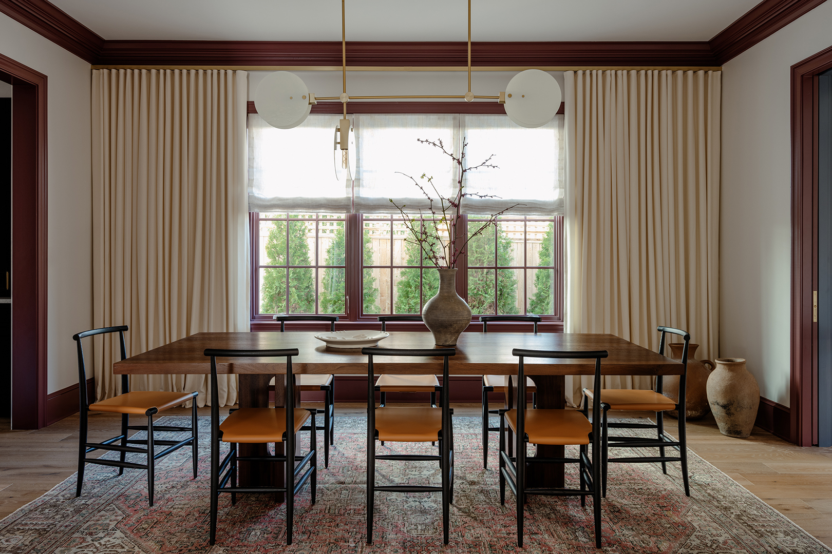 dining room with maroon trim