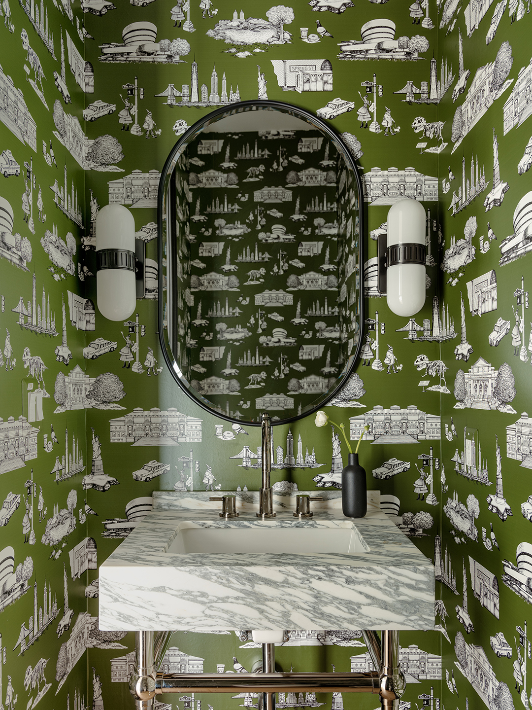 green wallpapered powder room