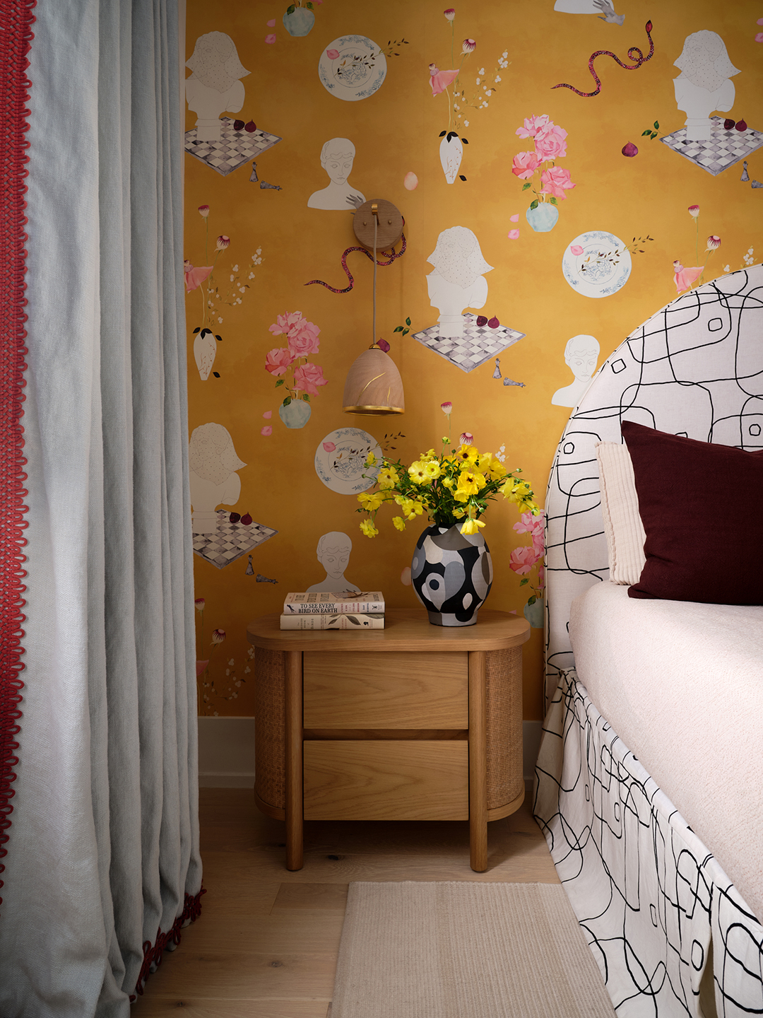 bedroom with whimsical yellow wallpaper