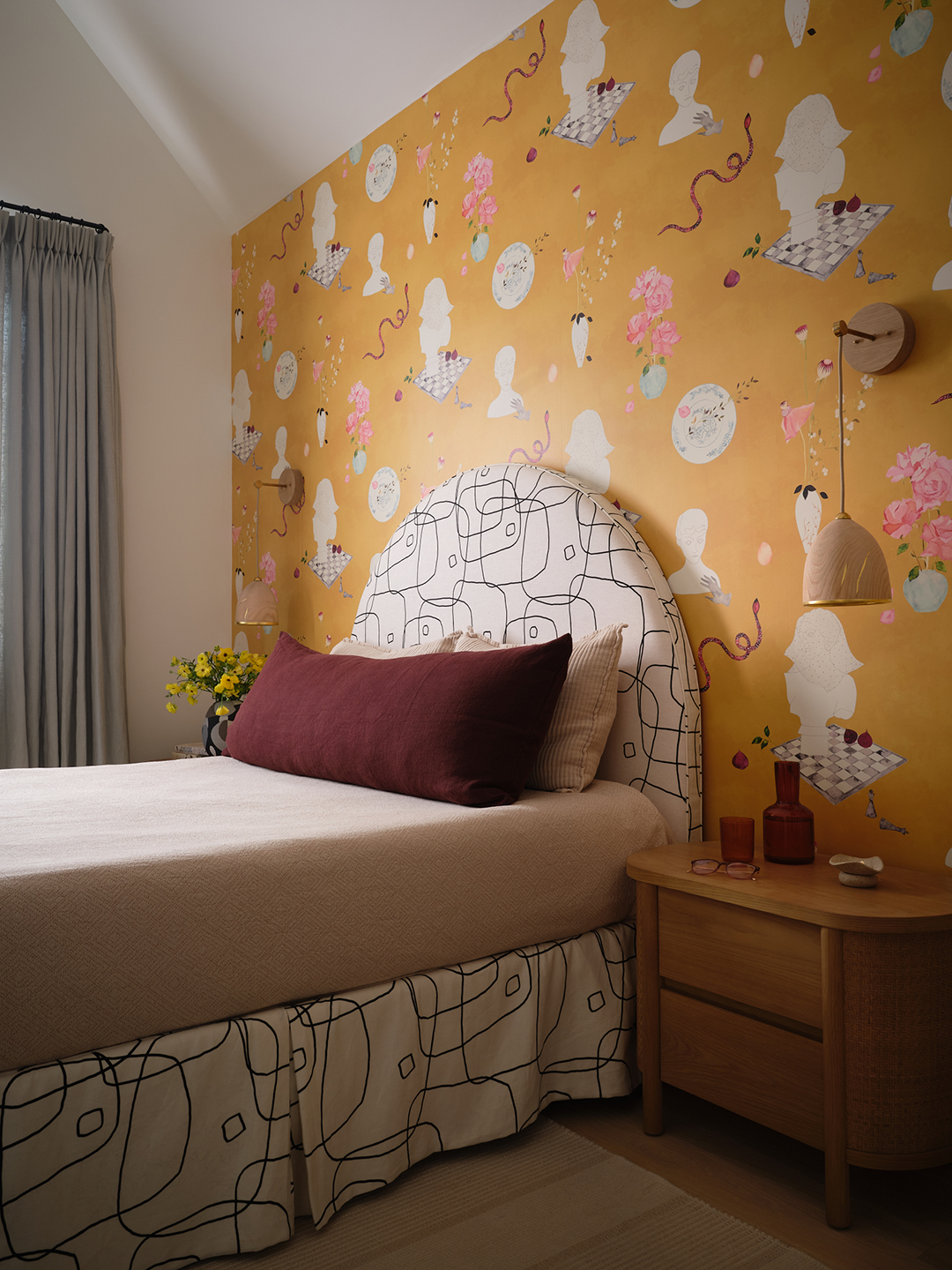 bedroom with whimsical yellow wallpaper