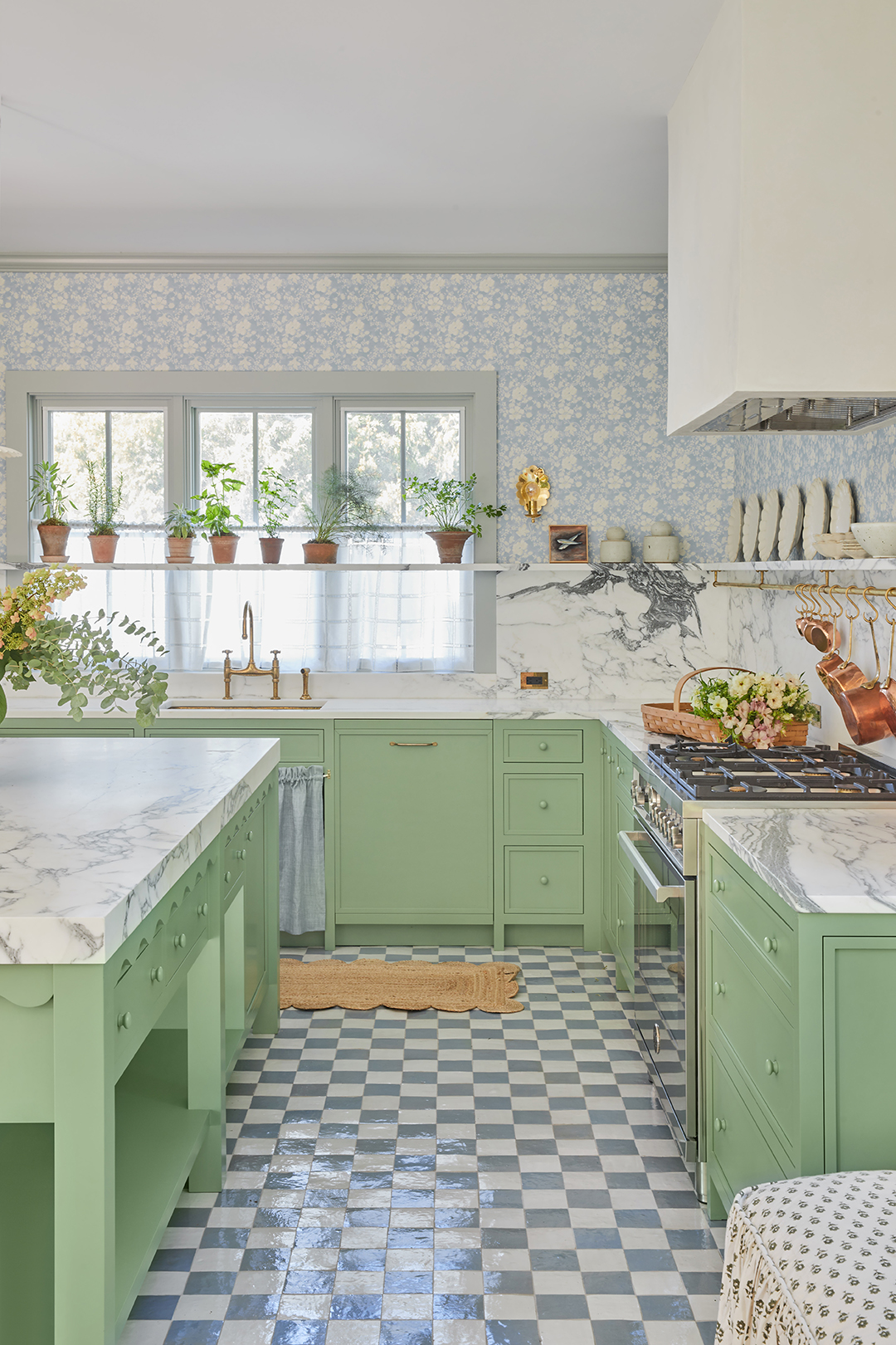 Green kitchen with checkerboard floor