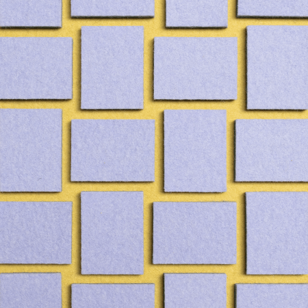  Close-up detail of lavender- and yellow-colored felt weave.