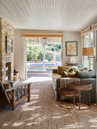 living room overlooking a pool