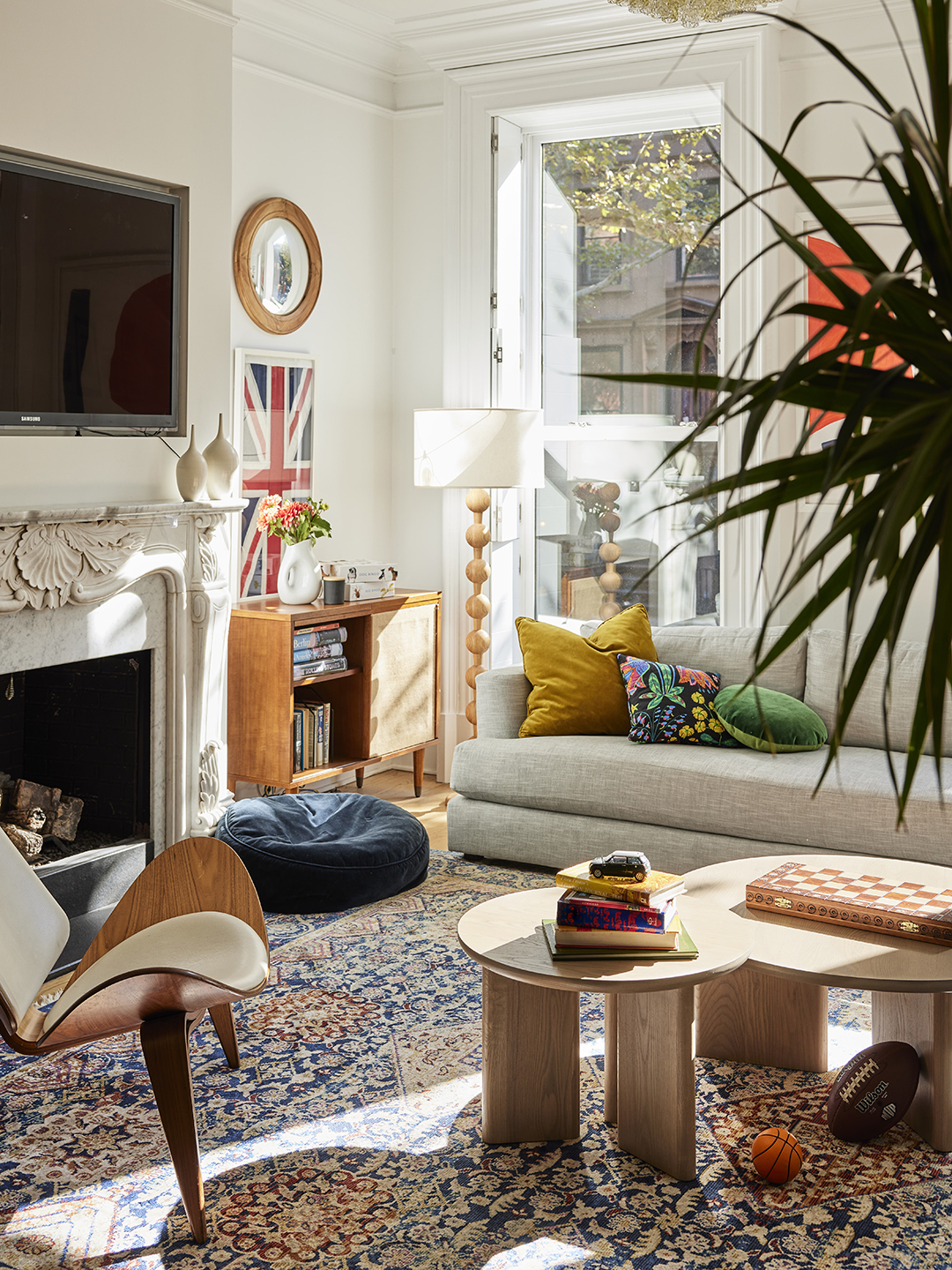 Living room with gray sofa and bean bag chair