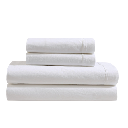  Product shot of white cotton sheets.