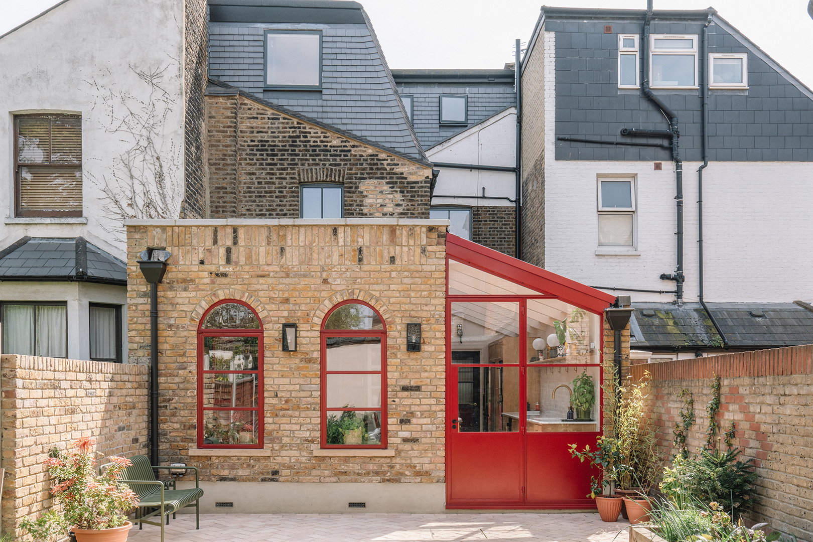 brick house with red door