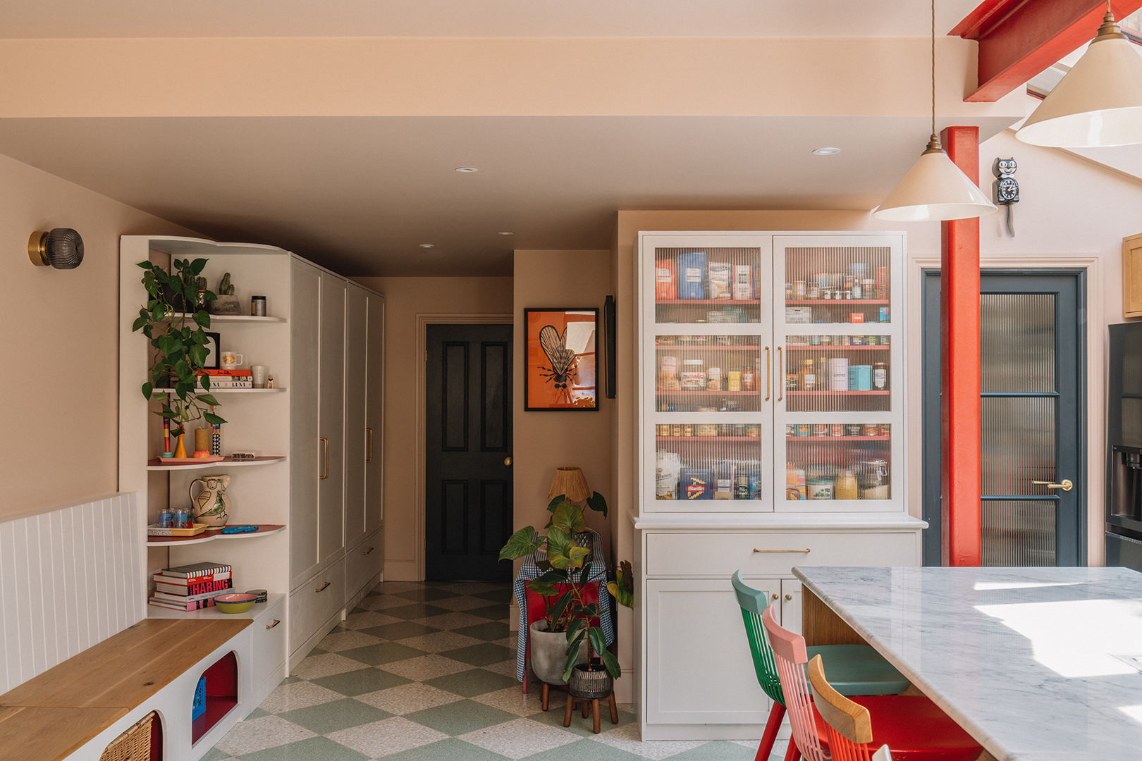 Kitchen with transparent pantry cabinets