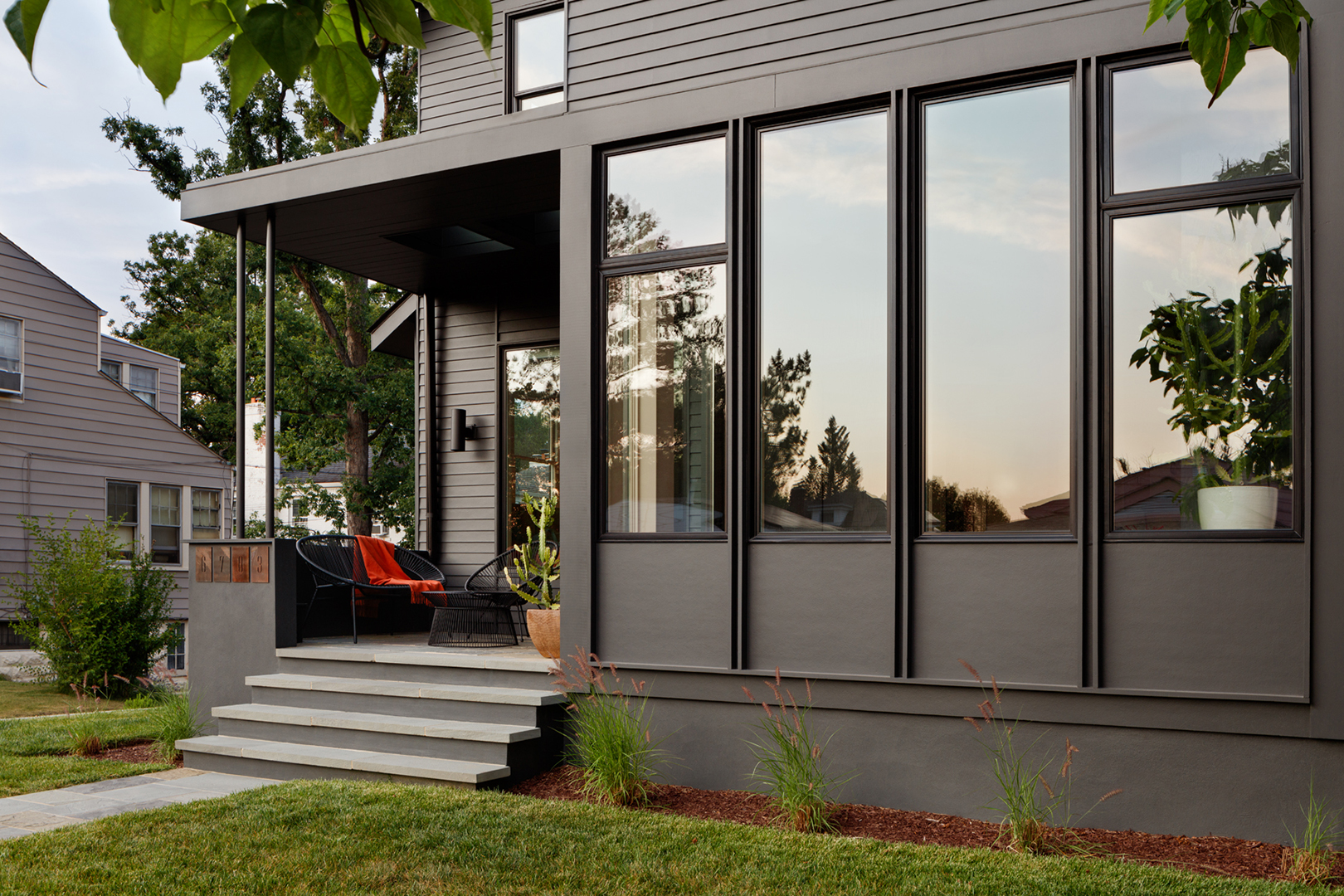 black house with large windows