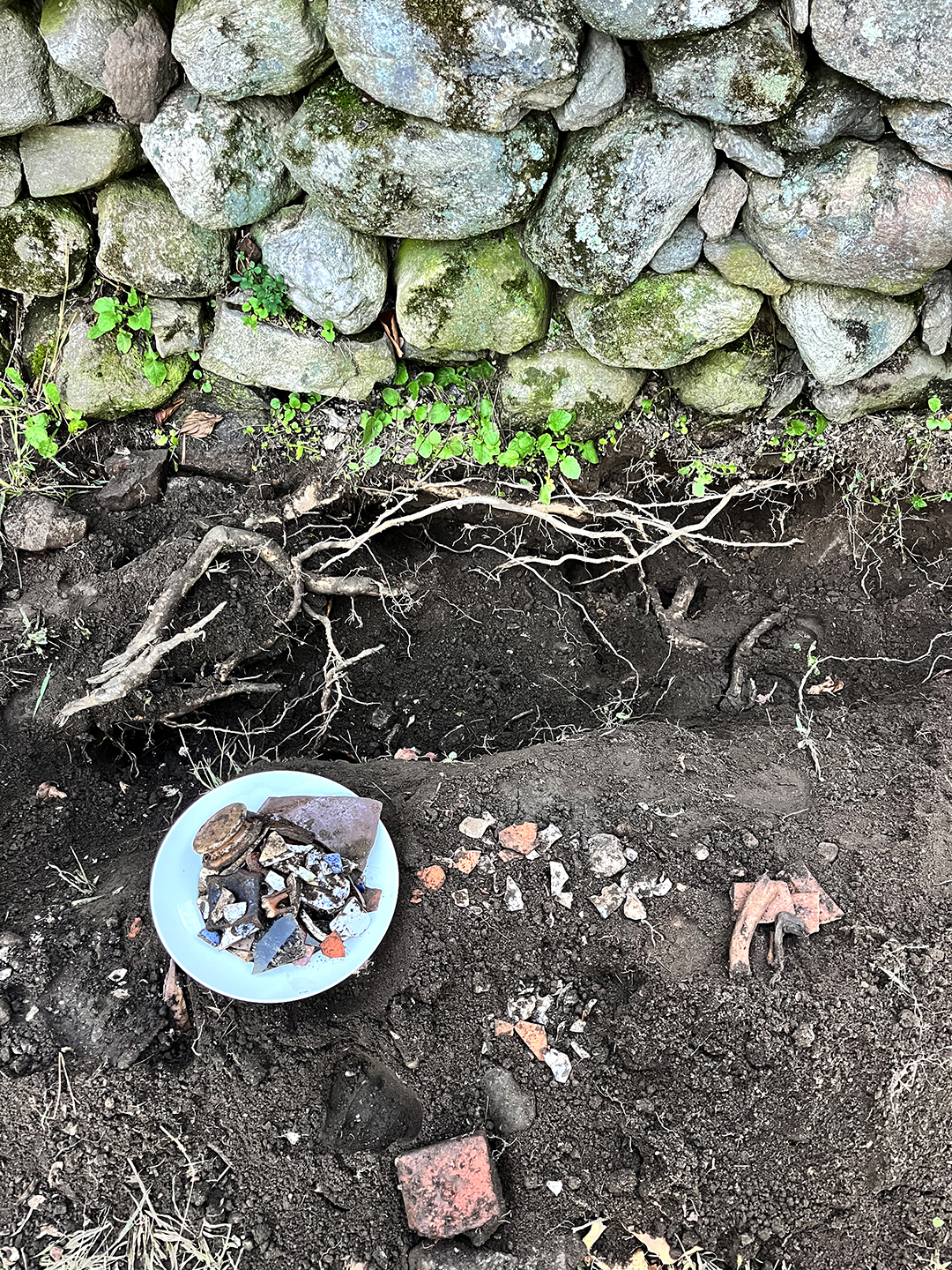 Stone wall with artifacts