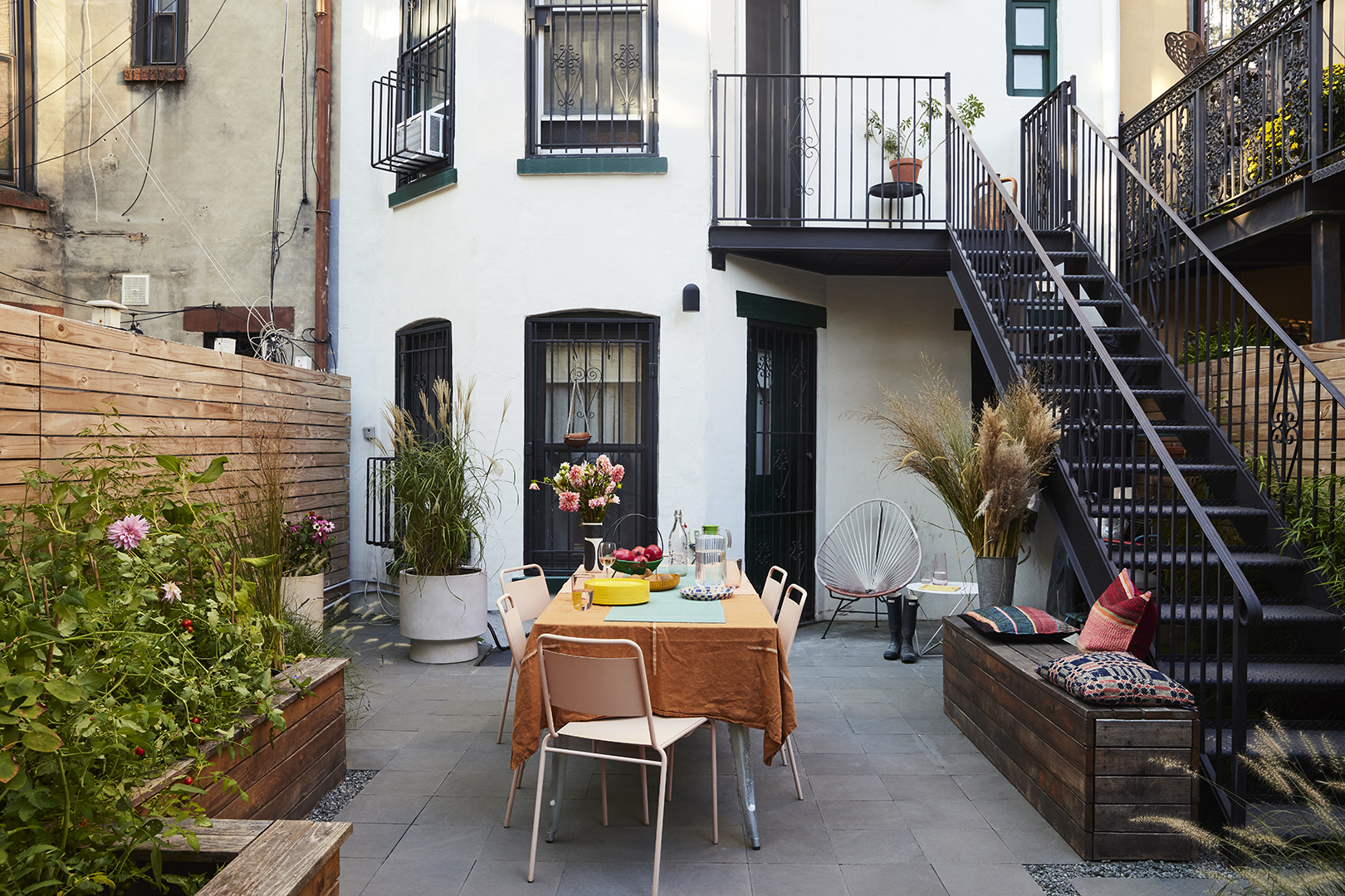 white brownstone with outdoor dining area