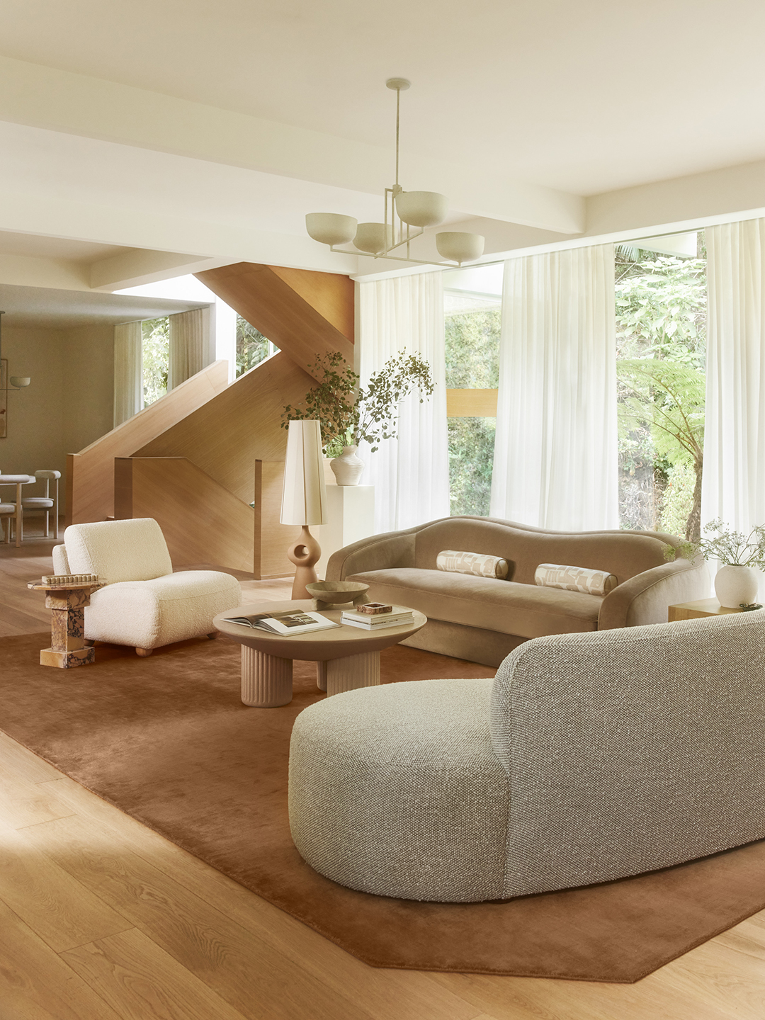 living room near wood stairs