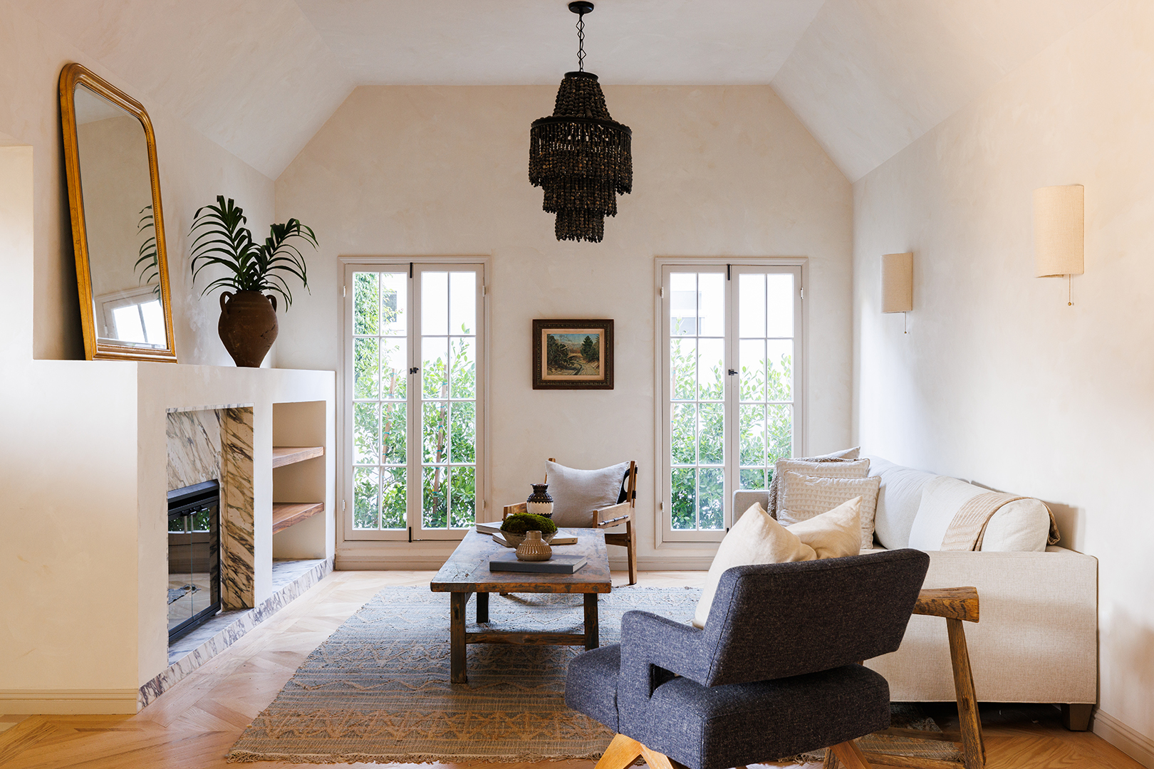 living room with marble fireplace