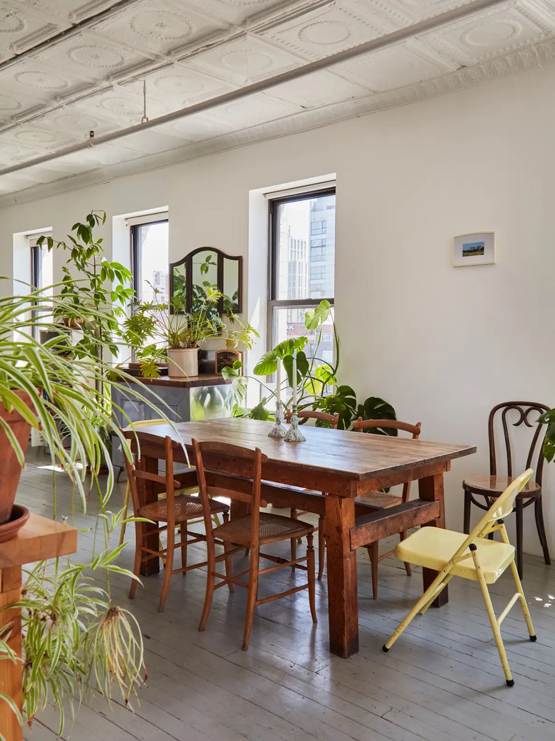 yellow chair and wood dining table