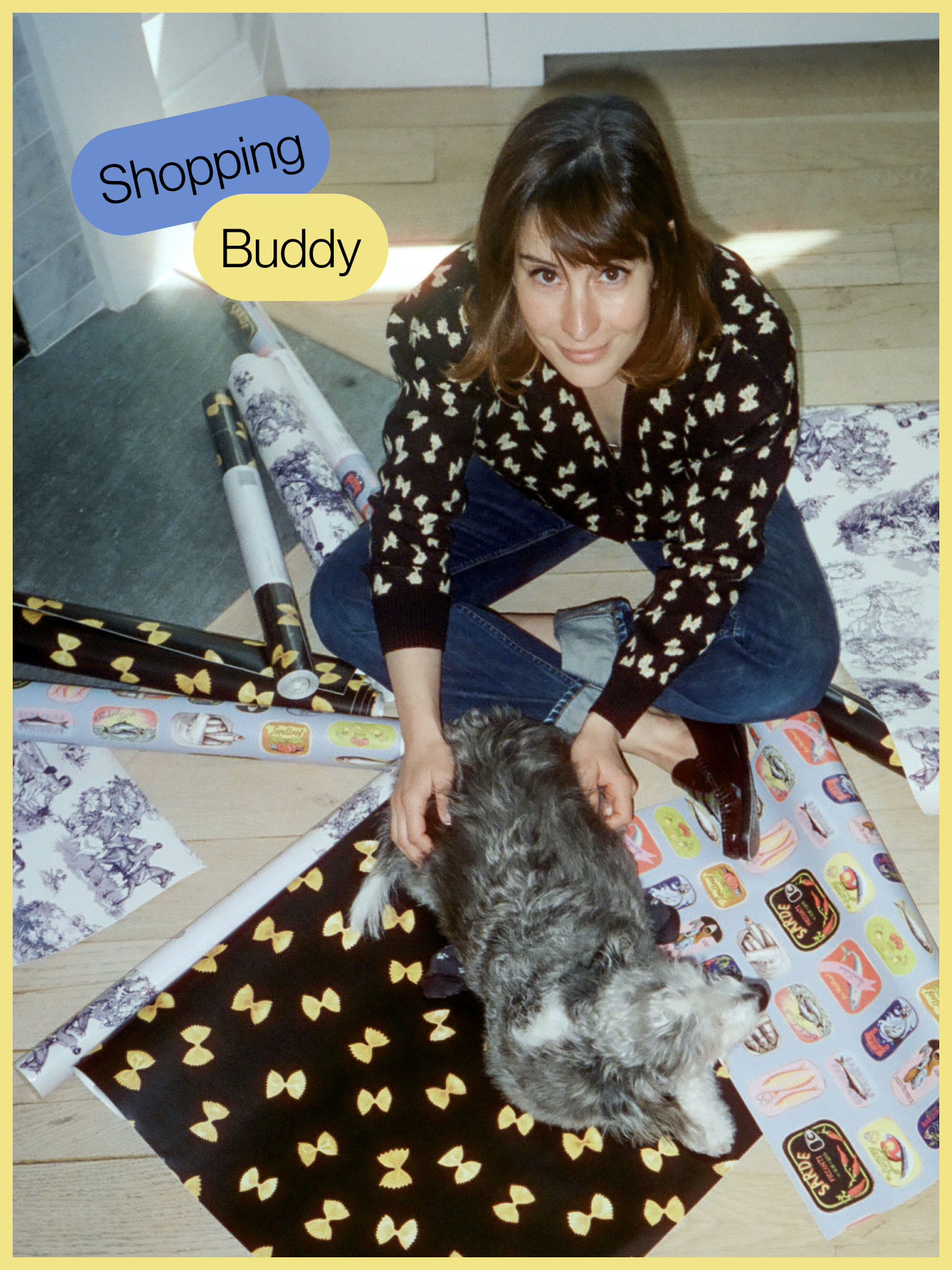 Woman on floor with wallpaper samples