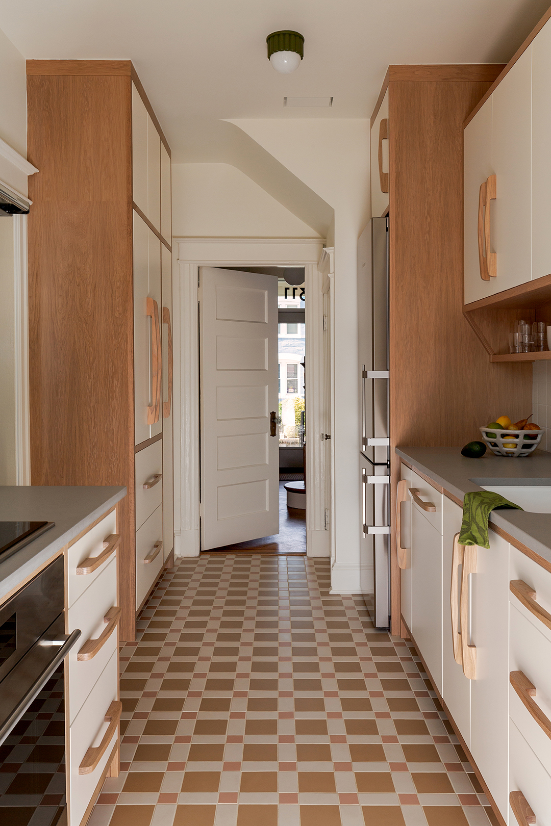 wood and white galley kitchen cabinets