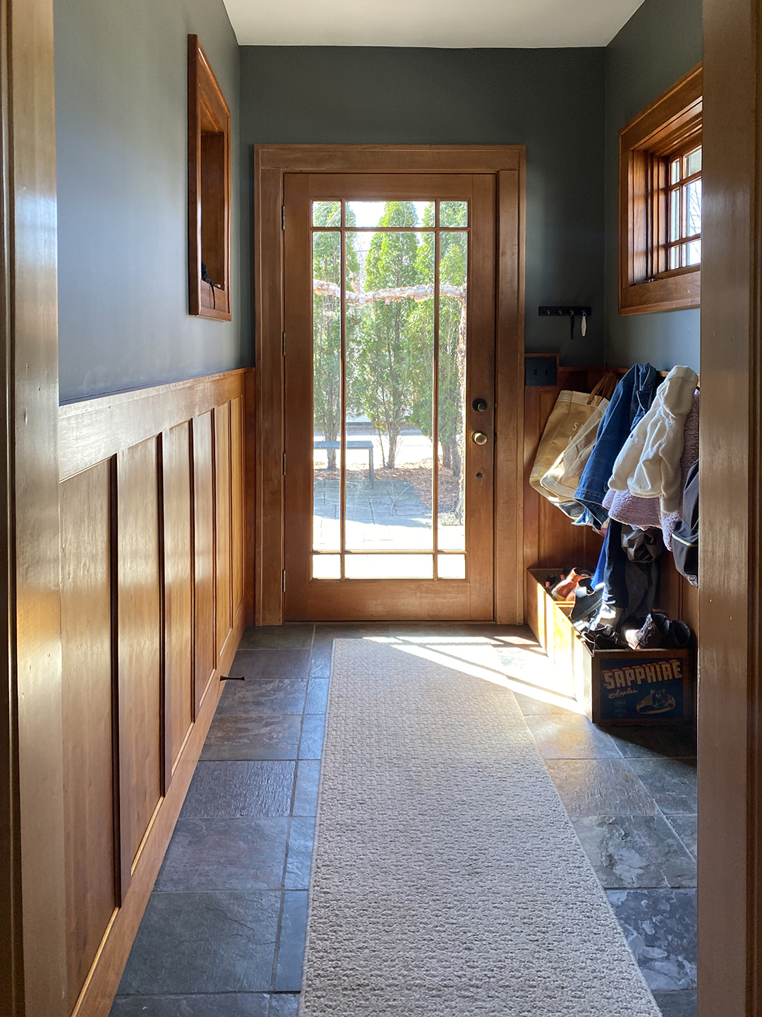 wood trimmed mudroom