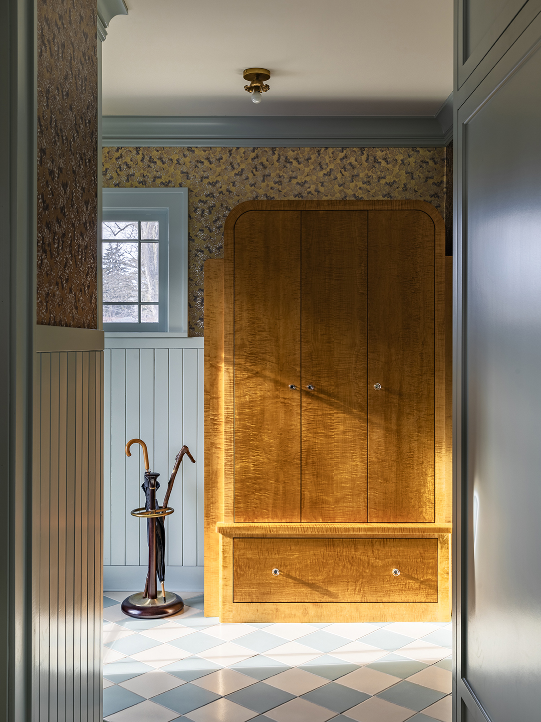 light shining on wood cabinet