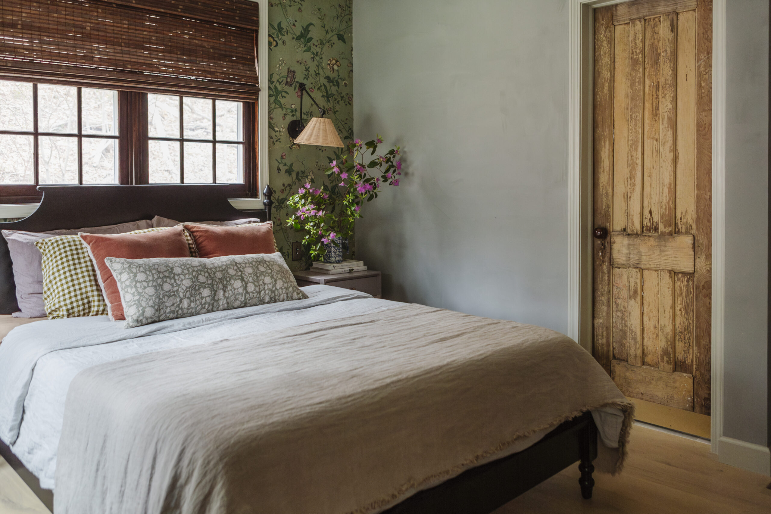 bedroom with green floral wallpaper