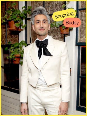 Man in white suit and black bow tie