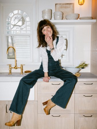 woman sitting on counter