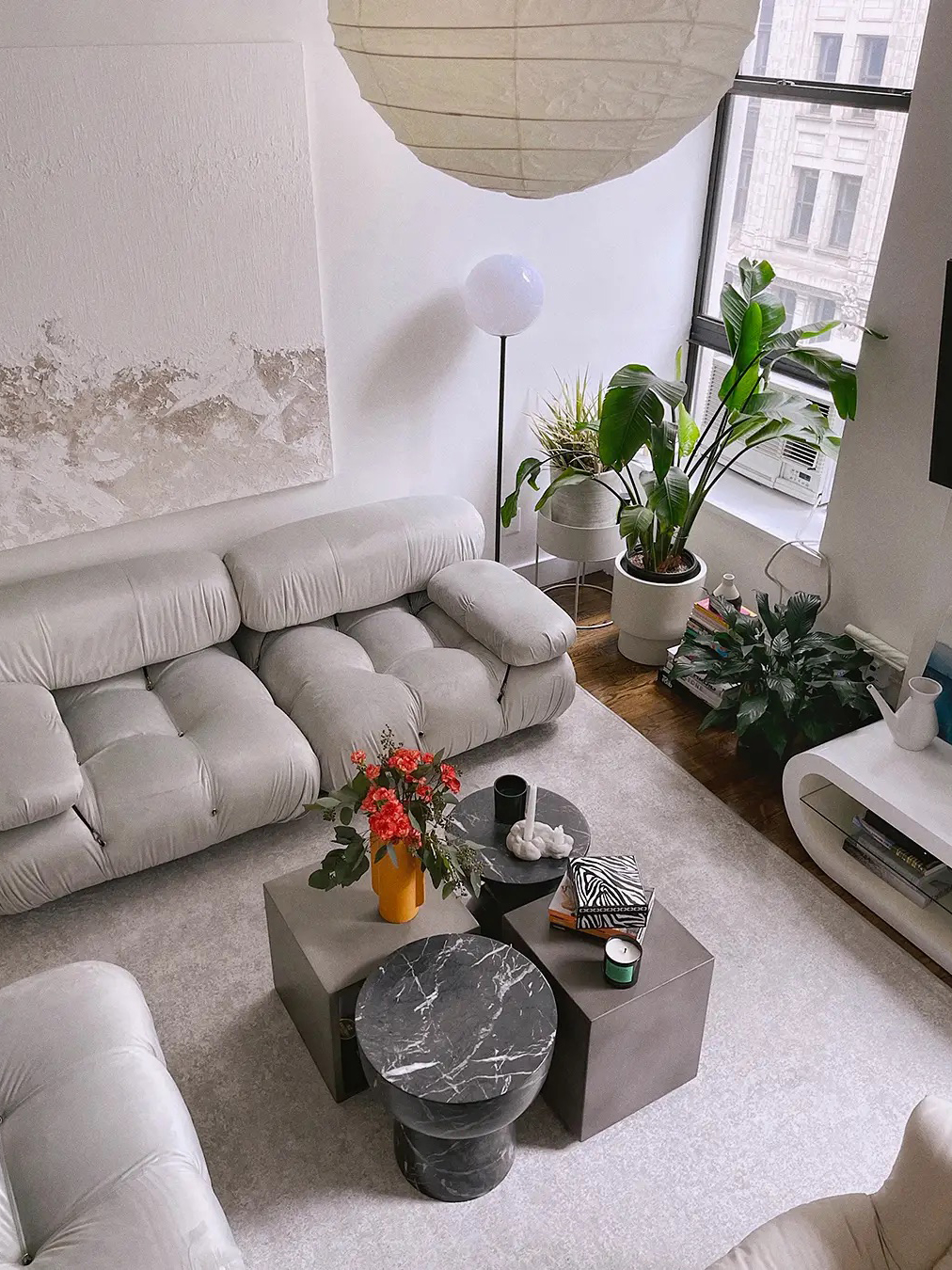 gray sofa and coffee tables