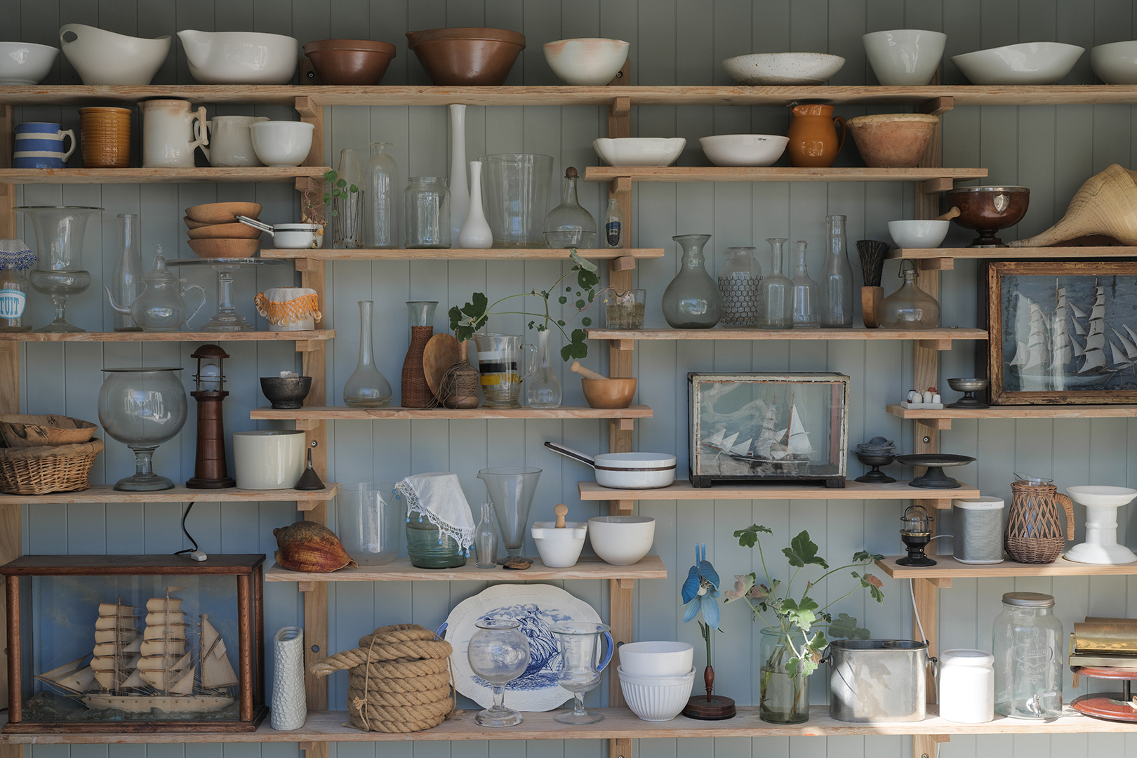 wood shelves topped with bowls
