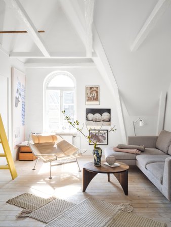 living room with pitched ceiling