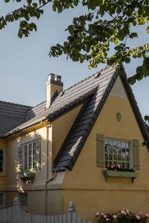 yellow house with pitched roof