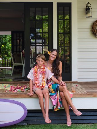 woman with son on the front porch