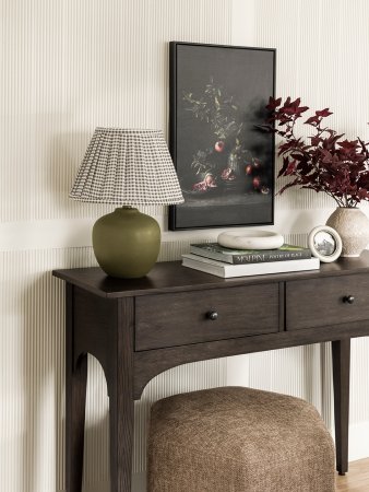 lamp on wood console table