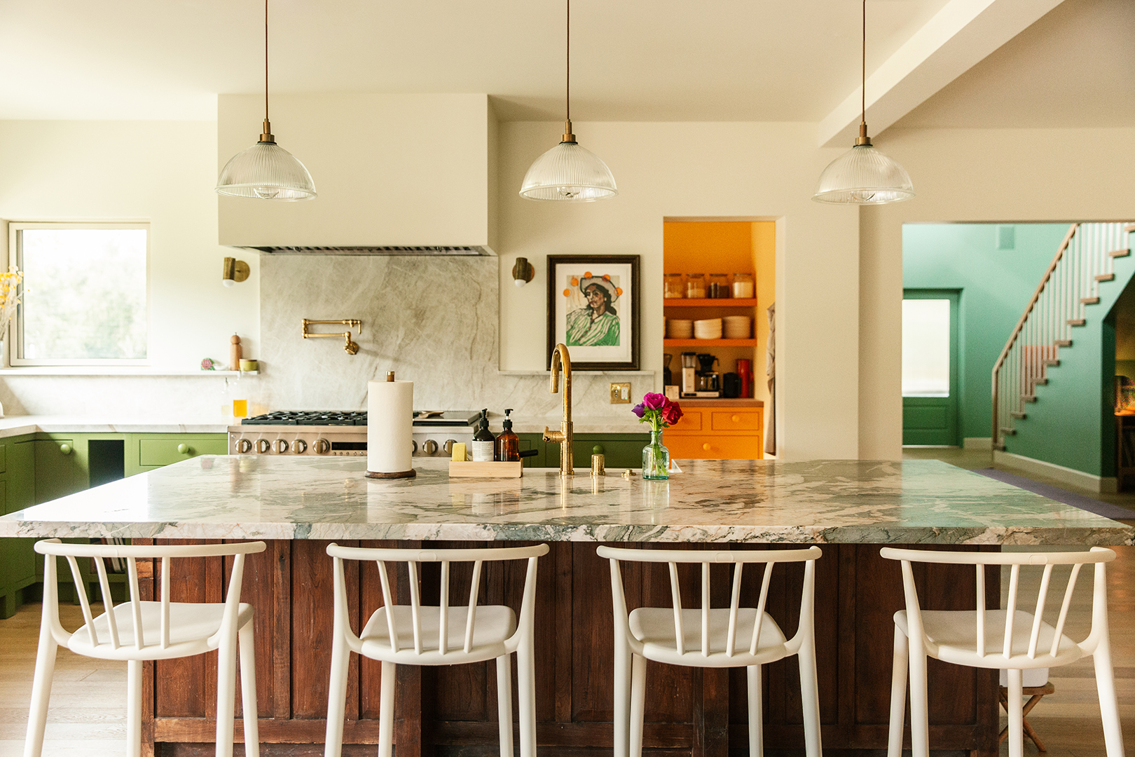 white stools at island