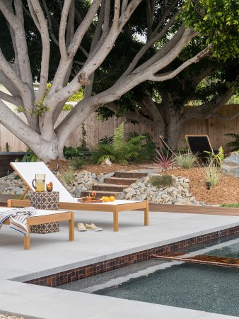 chaises next to pool