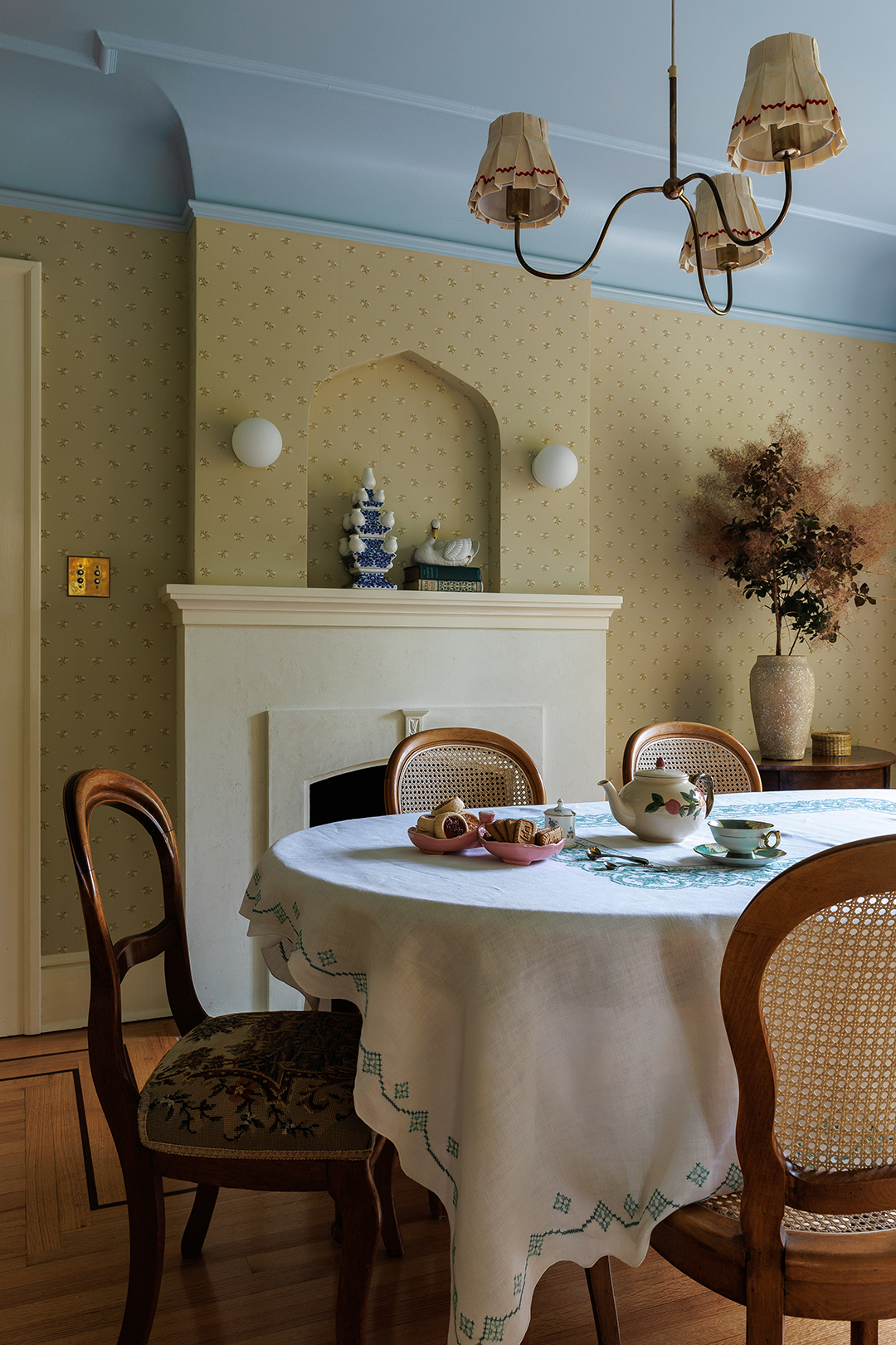 traditional dining room with blue ceiling