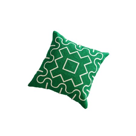  green throw pillow with white geometric stitching