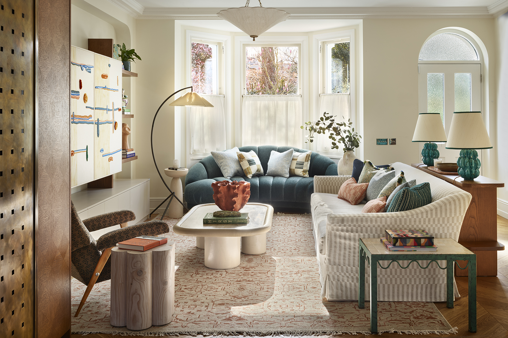 living room with blue sofa