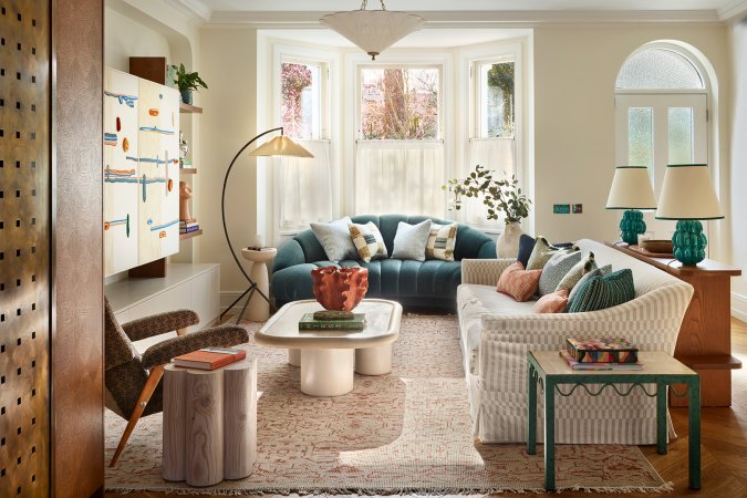 living room with blue sofa