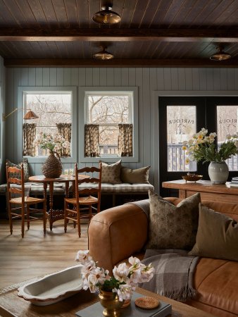 Lobby room with light blue walls and leather sofa