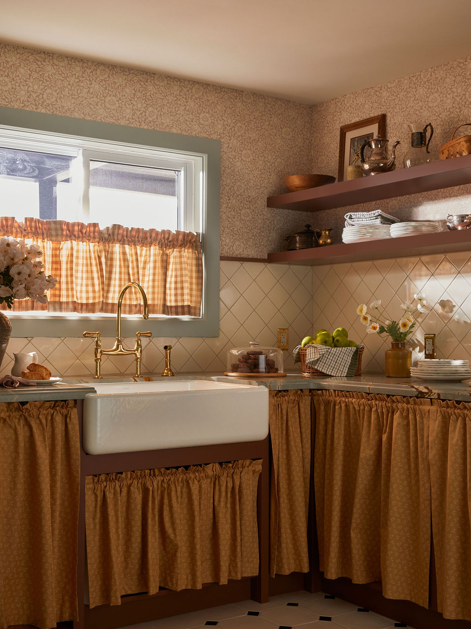 Kitchen with farm sink and skirts covering lower cabinets