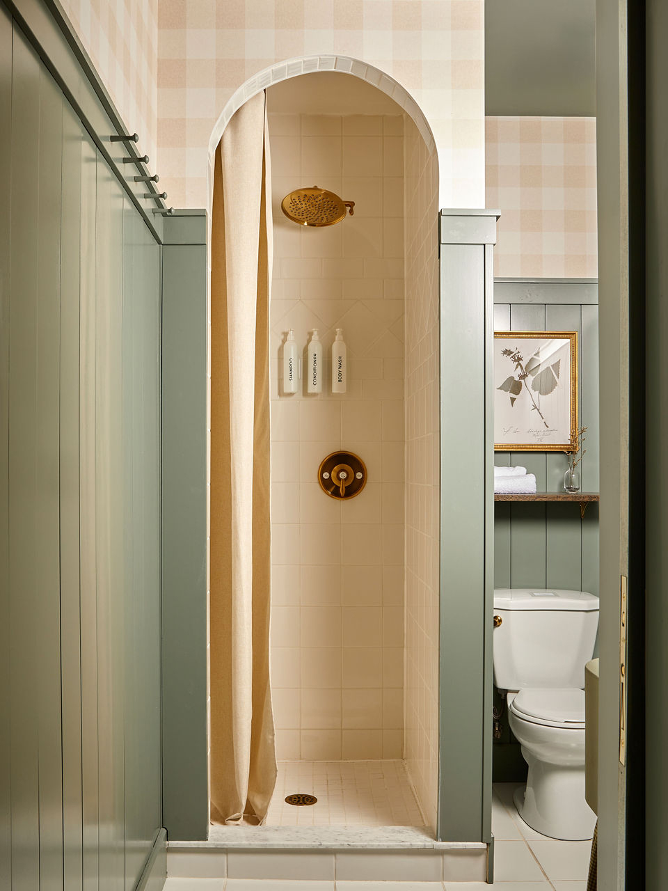 cream shower tiles with green walls