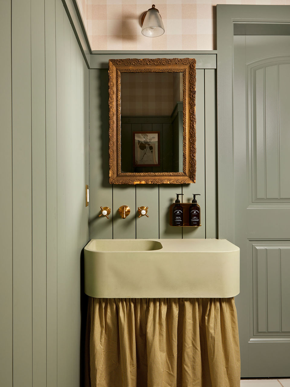 Bathroom sink with skirt