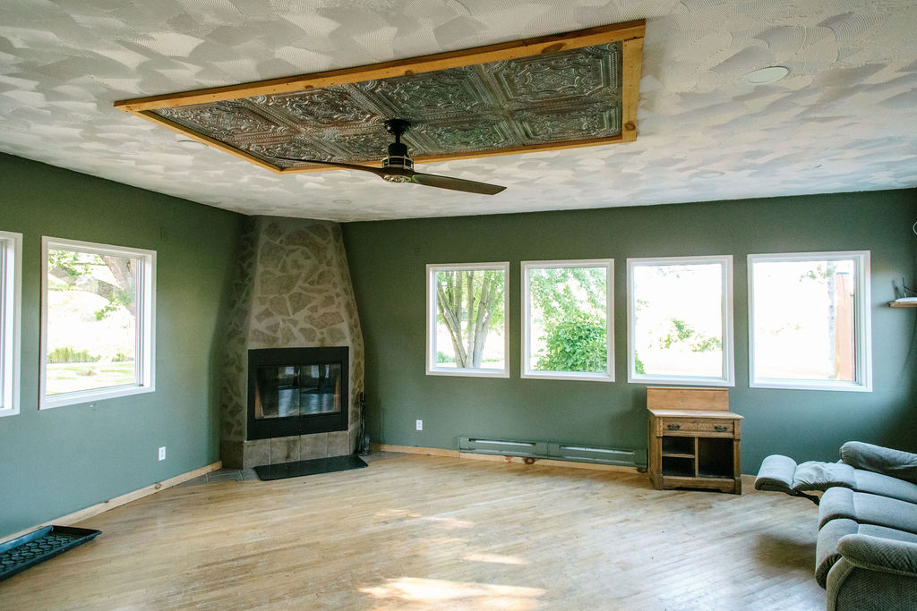 Old fireplace in a outdated room