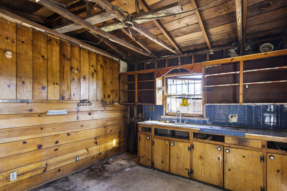 Dilapidated brown cabinet